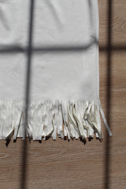 The Fringe Hem Slip Skirt in White